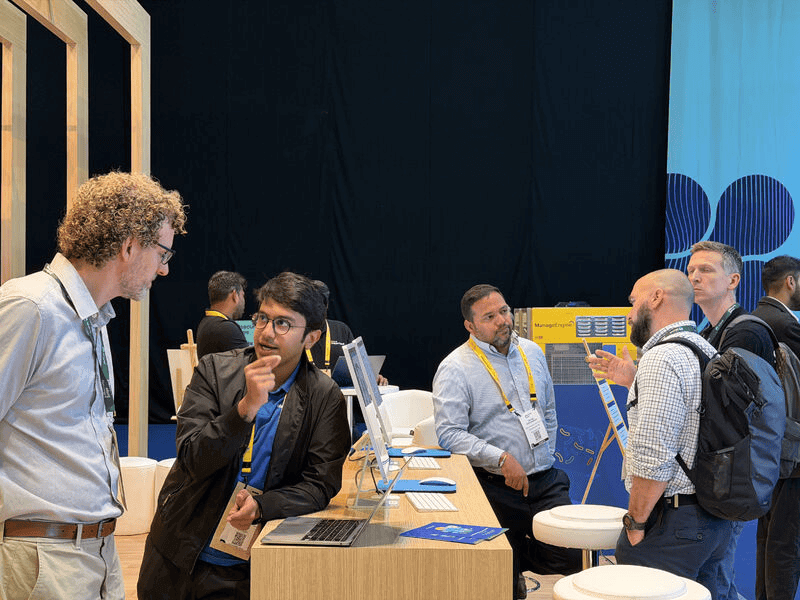 Team meeting visitors at a security conference